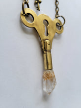 Load image into Gallery viewer, Antique Brass Clock Key with Clear Skeletal Root Quartz Handmade OOAK
