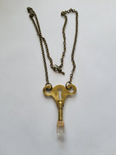 Load image into Gallery viewer, Antique Brass Clock Key with Clear Skeletal Root Quartz Handmade OOAK
