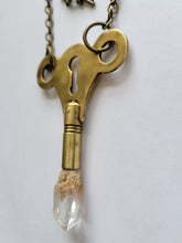 Load image into Gallery viewer, Antique Brass Clock Key with Clear Skeletal Root Quartz Handmade OOAK
