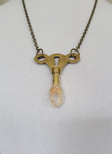 Load image into Gallery viewer, Antique Brass Clock Key with Clear Skeletal Root Quartz Handmade OOAK
