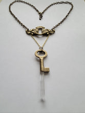 Load image into Gallery viewer, Antiuque Brass Escutcheon and Antique Brass Key with Hand Fitted Columbian Quartz Handmade OOAK
