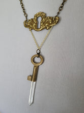 Load image into Gallery viewer, Antiuque Brass Escutcheon and Antique Brass Key with Hand Fitted Columbian Quartz Handmade OOAK
