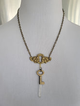 Load image into Gallery viewer, Antiuque Brass Escutcheon and Antique Brass Key with Hand Fitted Columbian Quartz Handmade OOAK
