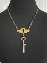 Load image into Gallery viewer, Antiuque Brass Escutcheon and Antique Brass Key with Hand Fitted Columbian Quartz Handmade OOAK
